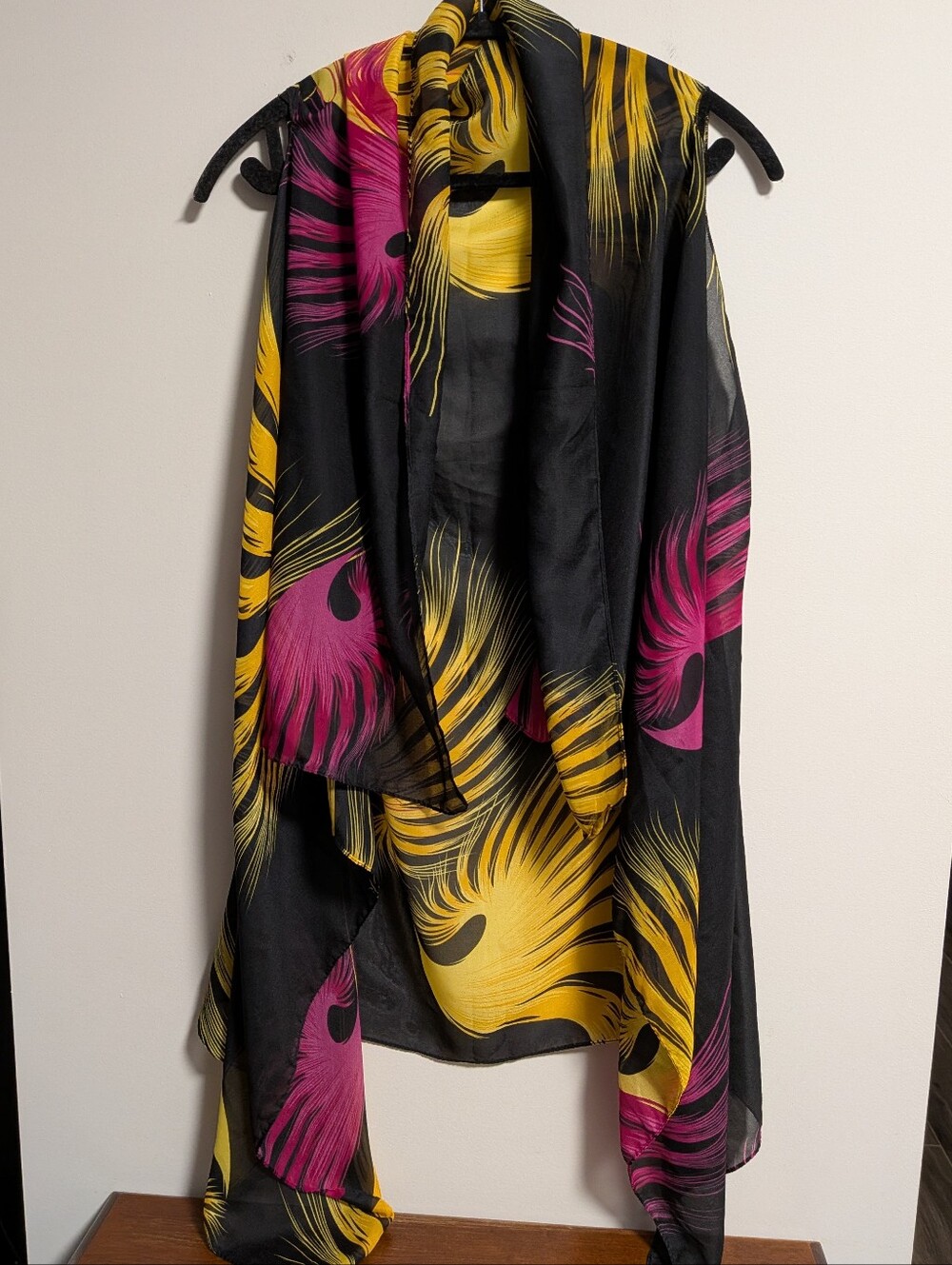 Accents By Lavello. Black Feather Print Convertible Vest in Pink and Yellow.